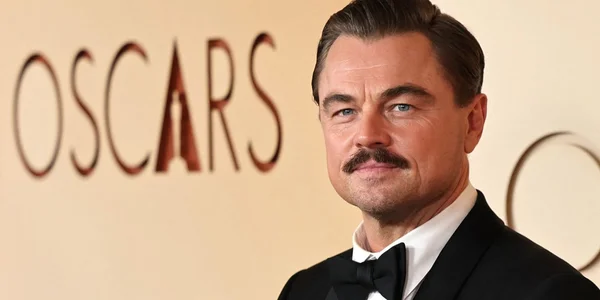 Леонардо ДіКапріо з вусами та таємною супутницею шокував усіх на Оскарі 2026 – фото